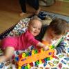 Babies working on sharing even at a young age of 5 months!