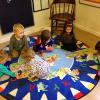 Working together on a large floor puzzle!