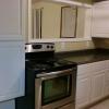 Our Kitchen! The false window allows me to keep an eye on the kids in playroom as I am preparing meals and snacks!